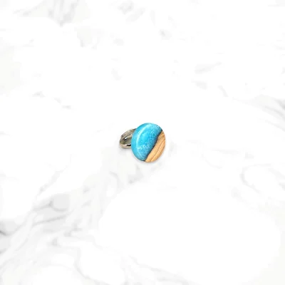 Handmade round olive wood ring with light blue resin – Exceptional & affordable