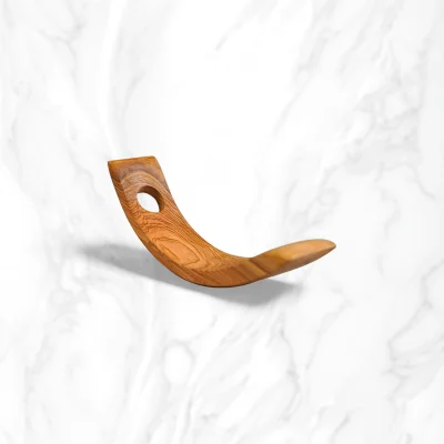 Wooden bottle holder in the shape of a crescent moon